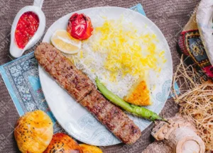 عکس چلوکباب ایرانی با نان سنتی و ترشی